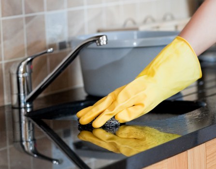 Commercial cleaner maintaining shared workspace areas in Barnet