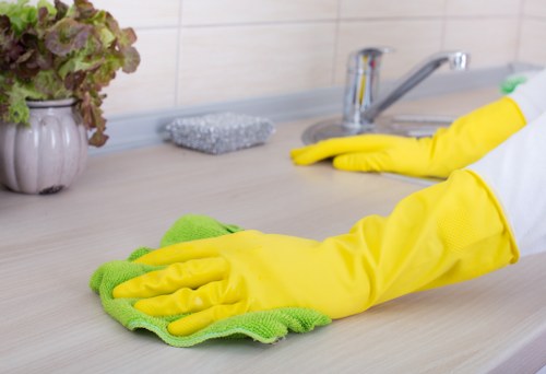 Local Airbnb cleaner preparing a guest-ready room in Barnet