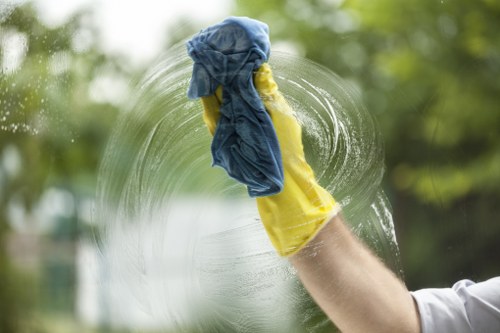 Upholstery deep cleaning tools used on a fabric sofa